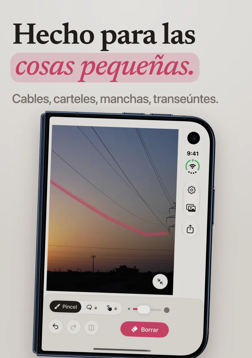 Mend en iPhone Duo con un trazo rosa a lo largo de un cable eléctrico que cruza el cielo del atardecer