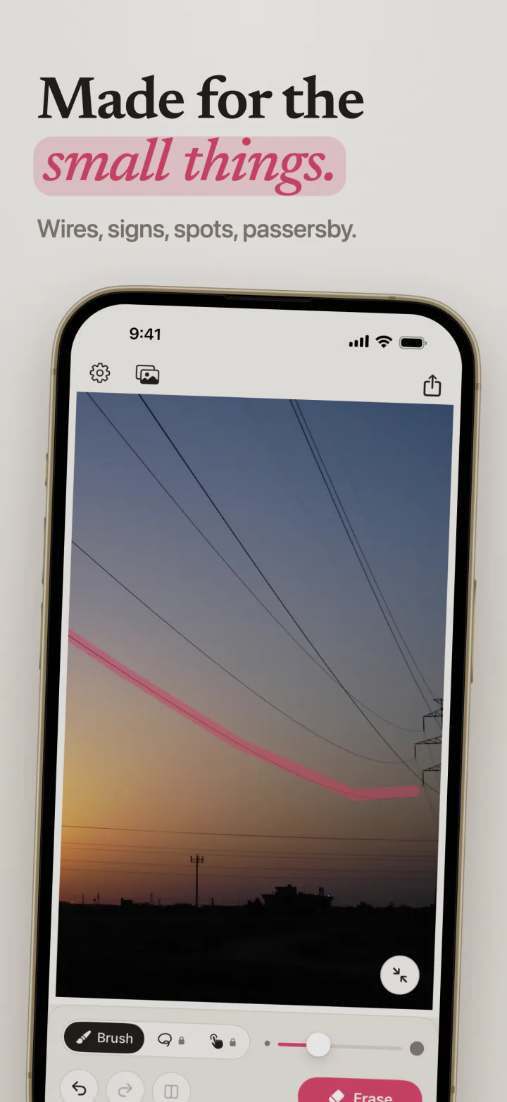 Mend on iPhone with a pink stroke painted along a power line crossing an evening sky